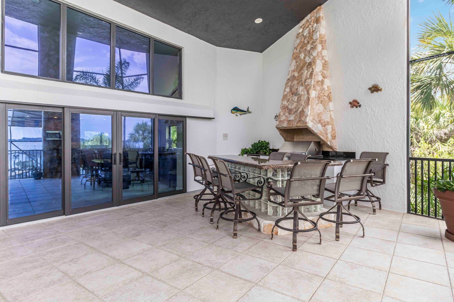 Second-floor patio with outdoor furnishings