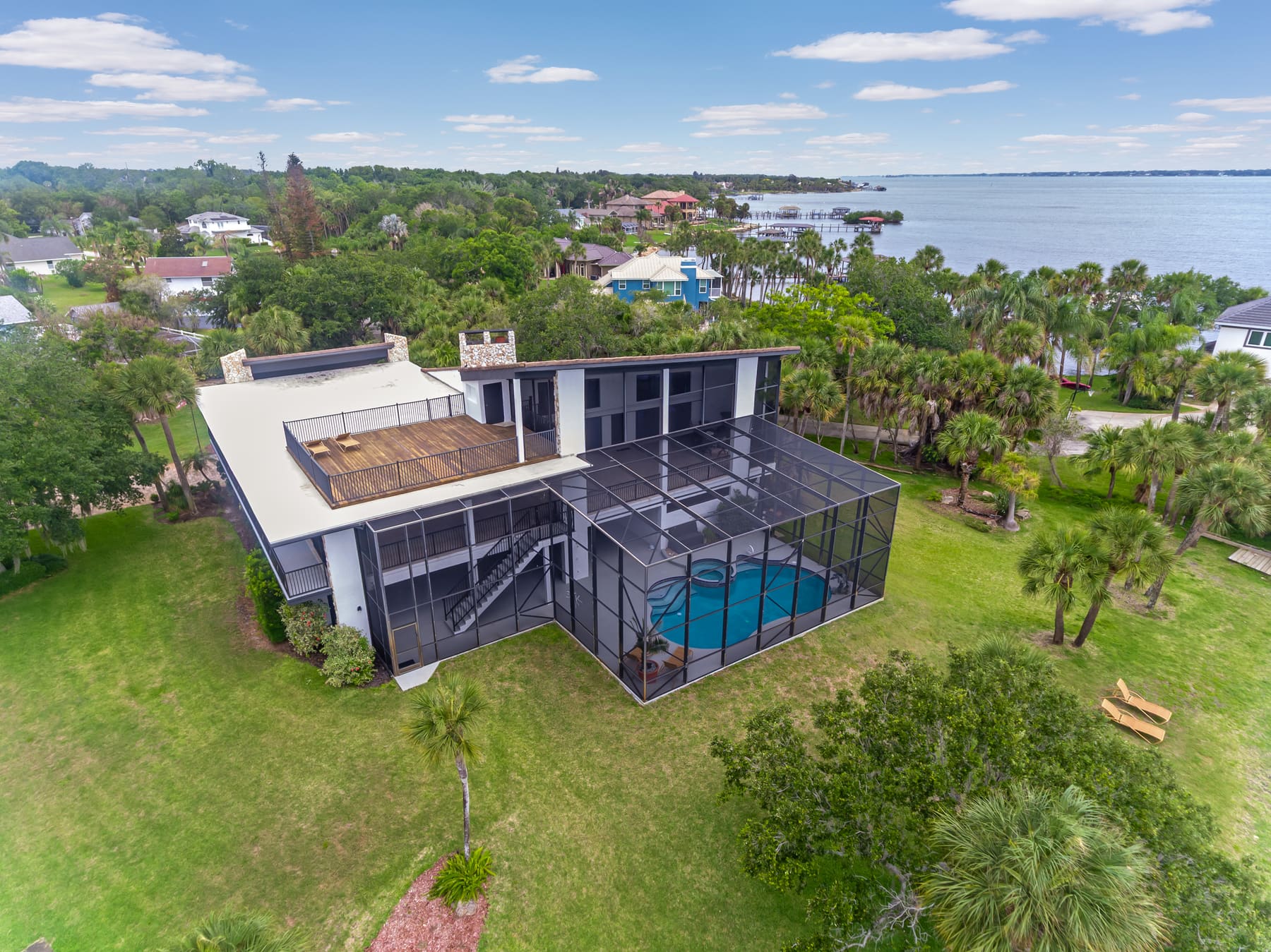 Aerial view of the house and waterfront lot