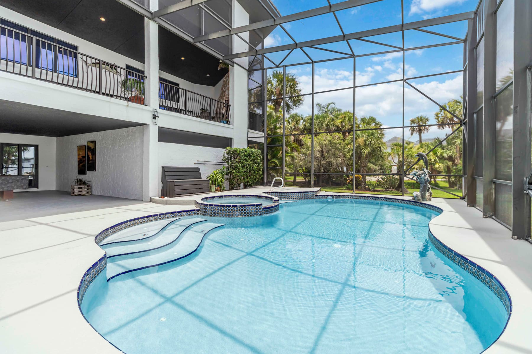 Pool deck and spa overlooking the river