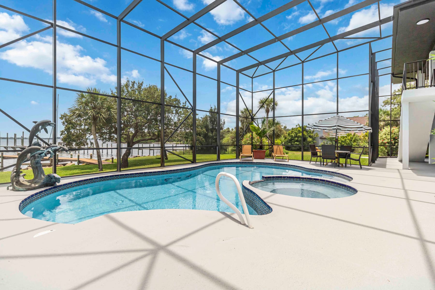 View of the pool and surrounding patio