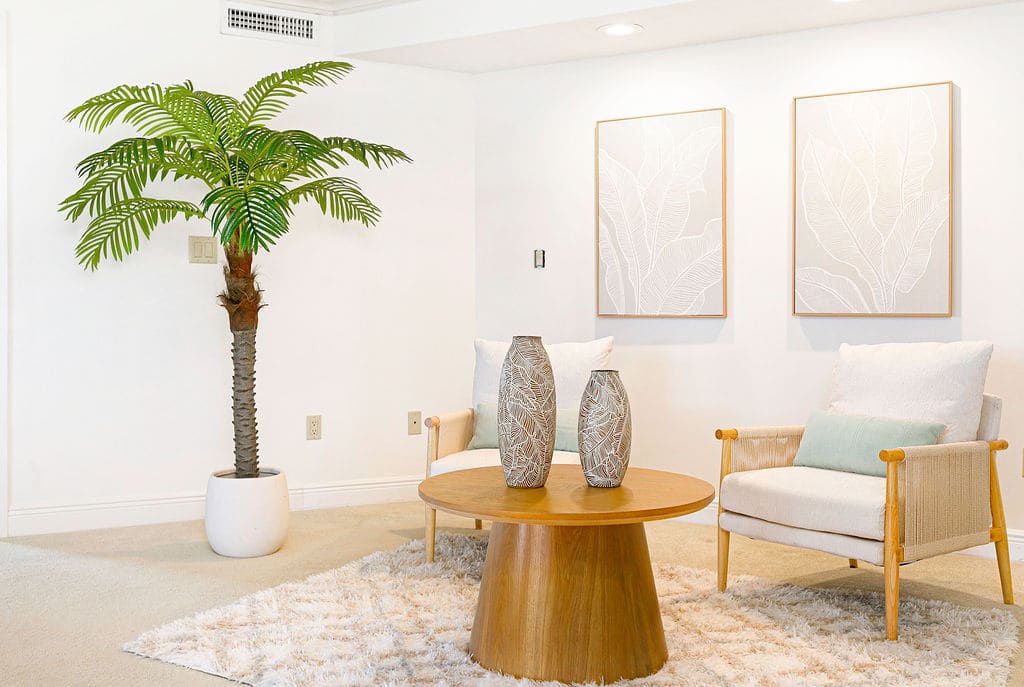 Staged second-floor primary bedroom seating nook